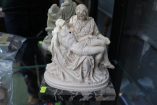 La Madonna della Pieta by A Santini resin on Marble rectangular base. 19cm in Height