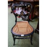 Victorian Lacquered Mother of Pearl inlaid cane seated chair