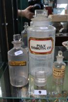 Antique Apothecary jars to include Bismuth, Chloral Hydroxide and a Alcohol jar