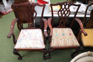 Pair of 20thC Mahogany Elbow chairs with pierced back and upholstered drop in seat