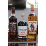 2 Bottles of Captain Morgan's Rum and a 70cl Bottle of Woods Old Navy Rum