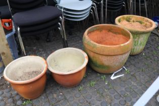 2 terracotta pots and 2 stoneware plant pots