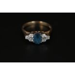 Ladies 9ct Gold Blue Topaz and Diamond set ring with open mount Size K. 2.2g total weight