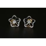 Pair of 18ct White Gold Diamond set Flower design earrings