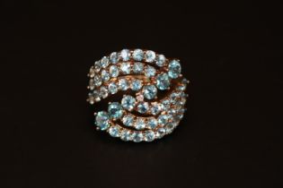 Ladies 9ct Gold Apatite and Diamond set dress ring of crossover design. Size N. 5.8g total weight