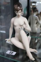 Royal Dux girl with a butterfly figure, marks to base with pink triangle 20cm in Height