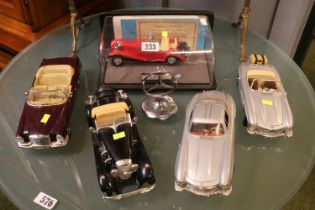 Collection of Maisto and Burago Model Vehicles and a Mercedes Radiator Cap