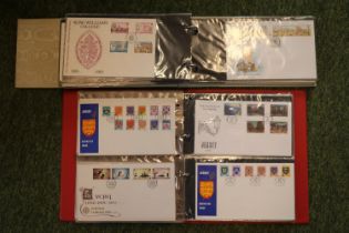 2 Albums of assorted First Day Covers and Stamps