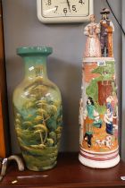 Continental figural decorated cylindrical vase with figural top and a Chinese style floor vase