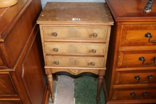Edwardian Bedside table of 3 drawers with brass handles over tapering legs