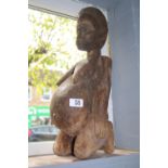 Ethnographic African tribal hardwood carved Nigerian fertility figure depicting a nude woman