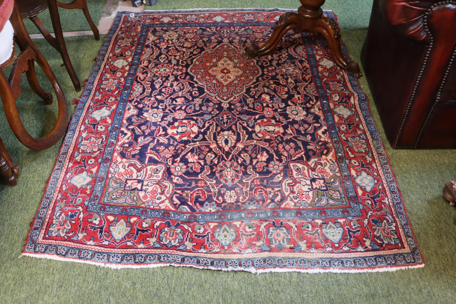 Good quality Red Ground Rug with central medallion 165cm in Length