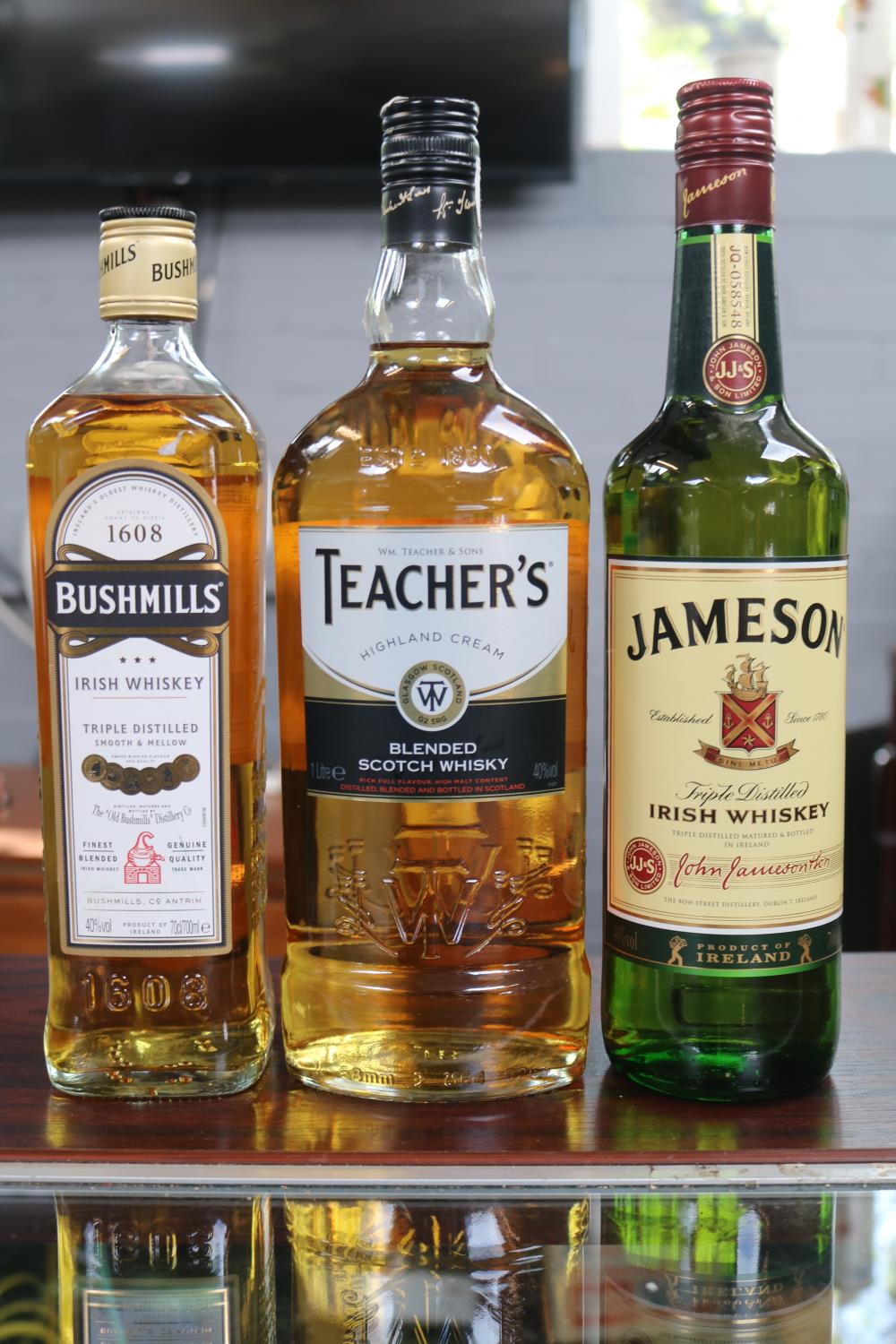 Bottle of Bushmills Irish Whiskey, Jameson Whiskey & a Bottle of Teachers Blended Whisky