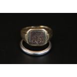 Ladies 9ct Gold Signet ring 5.4g total weight and a Platinum wedding bad 5.3g total weight
