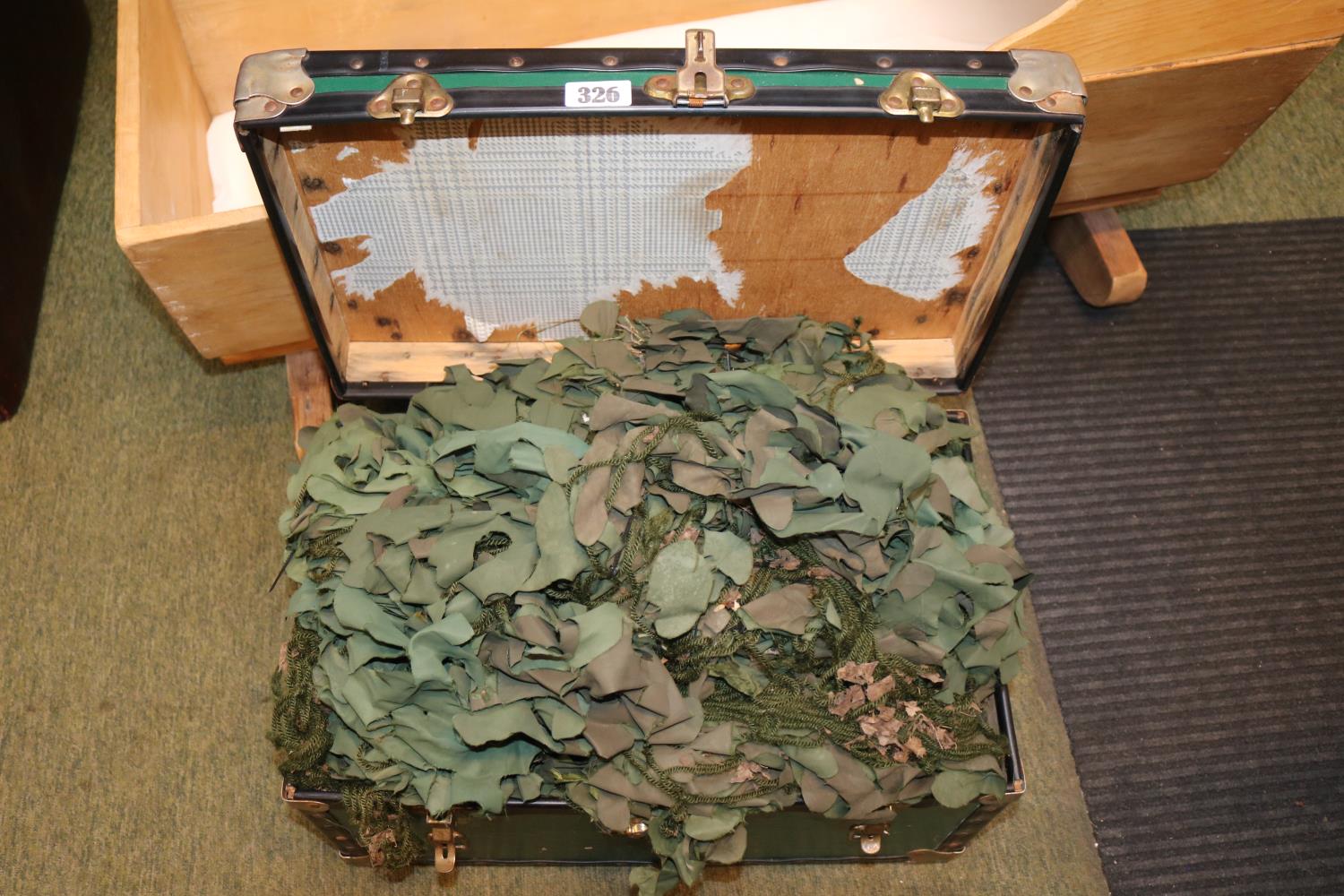 Traveling case with a Large amount of Camo webbing