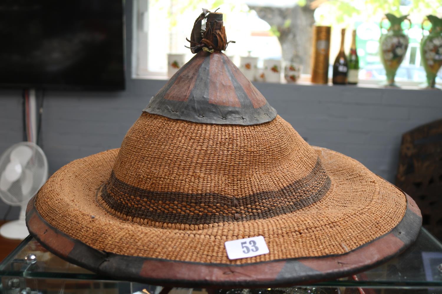 Broad brimmed traditional African tribal Mokorotlo hat from Lesotho in the form of Mount Qiloane.