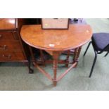 Oak corner drop leaf Cricket type table with turned supports and straight stretchers
