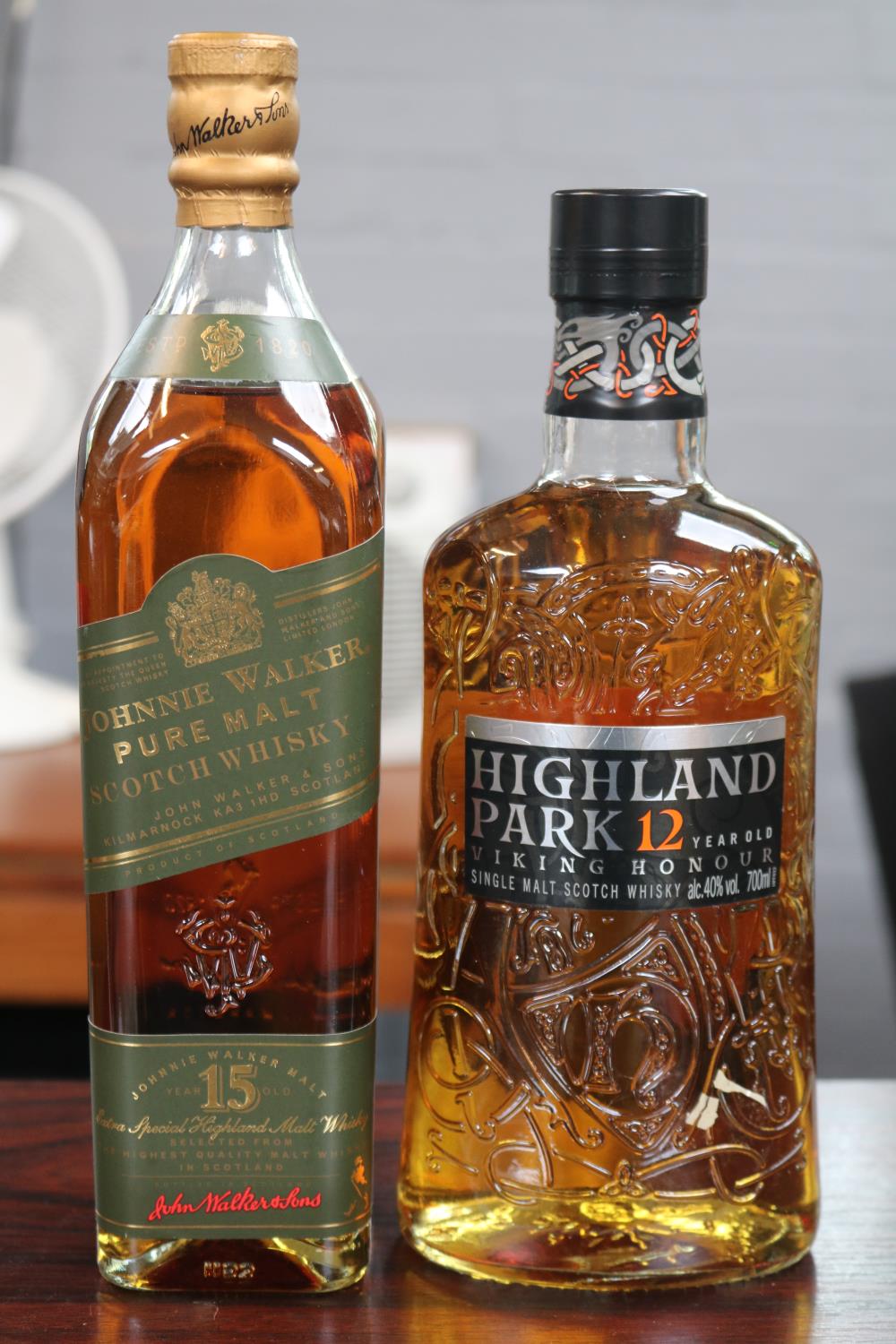 Bottle of Johnnie Walker Pure Malt Scotch Whisky 15 year green label and a bottle of Highland Park