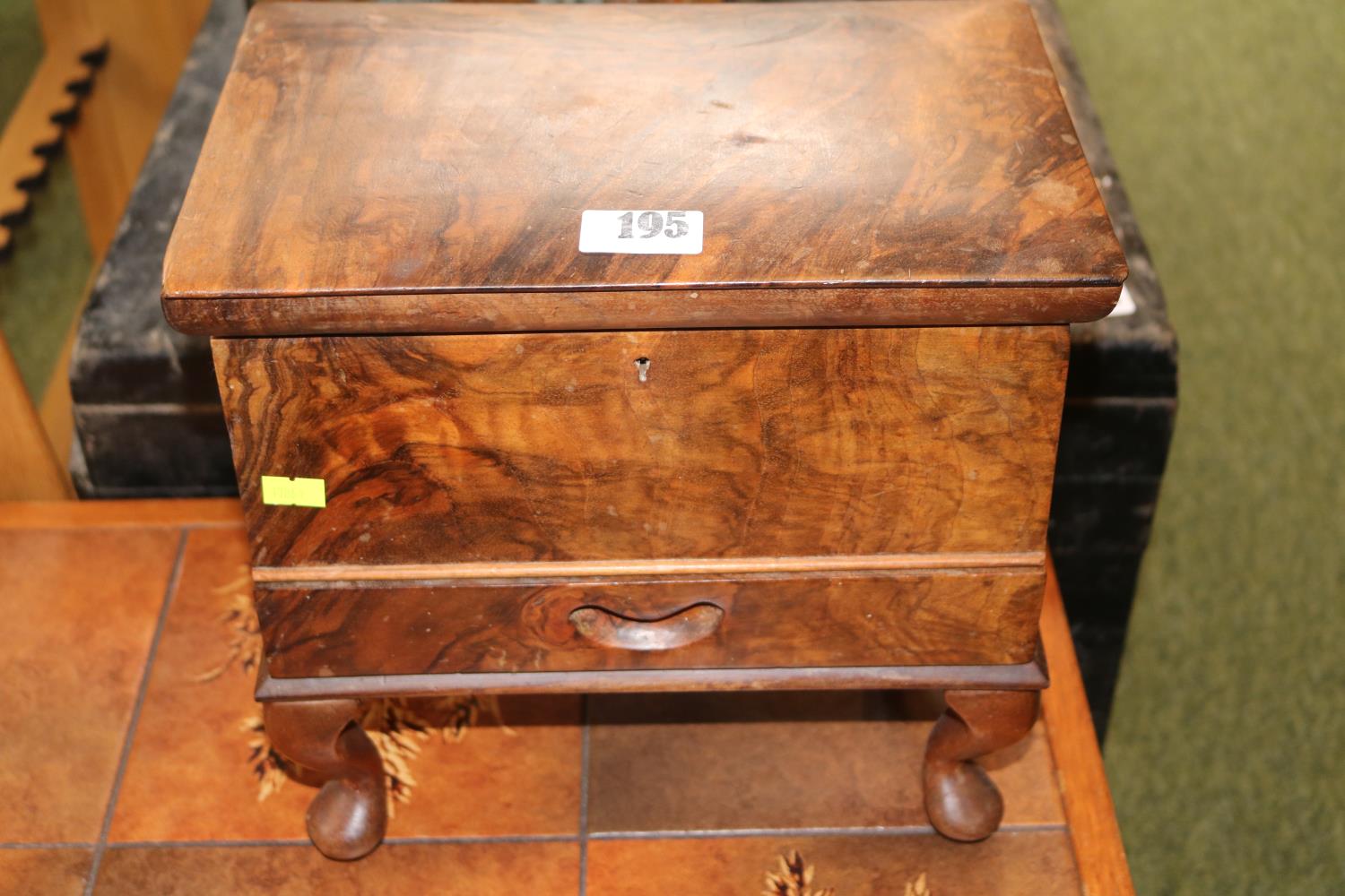 Walnut sewing box with fitted interior over cabriole legs