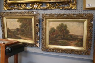 Pair of Gilt Gesso scroll framed Oil on canvas countryside scenes