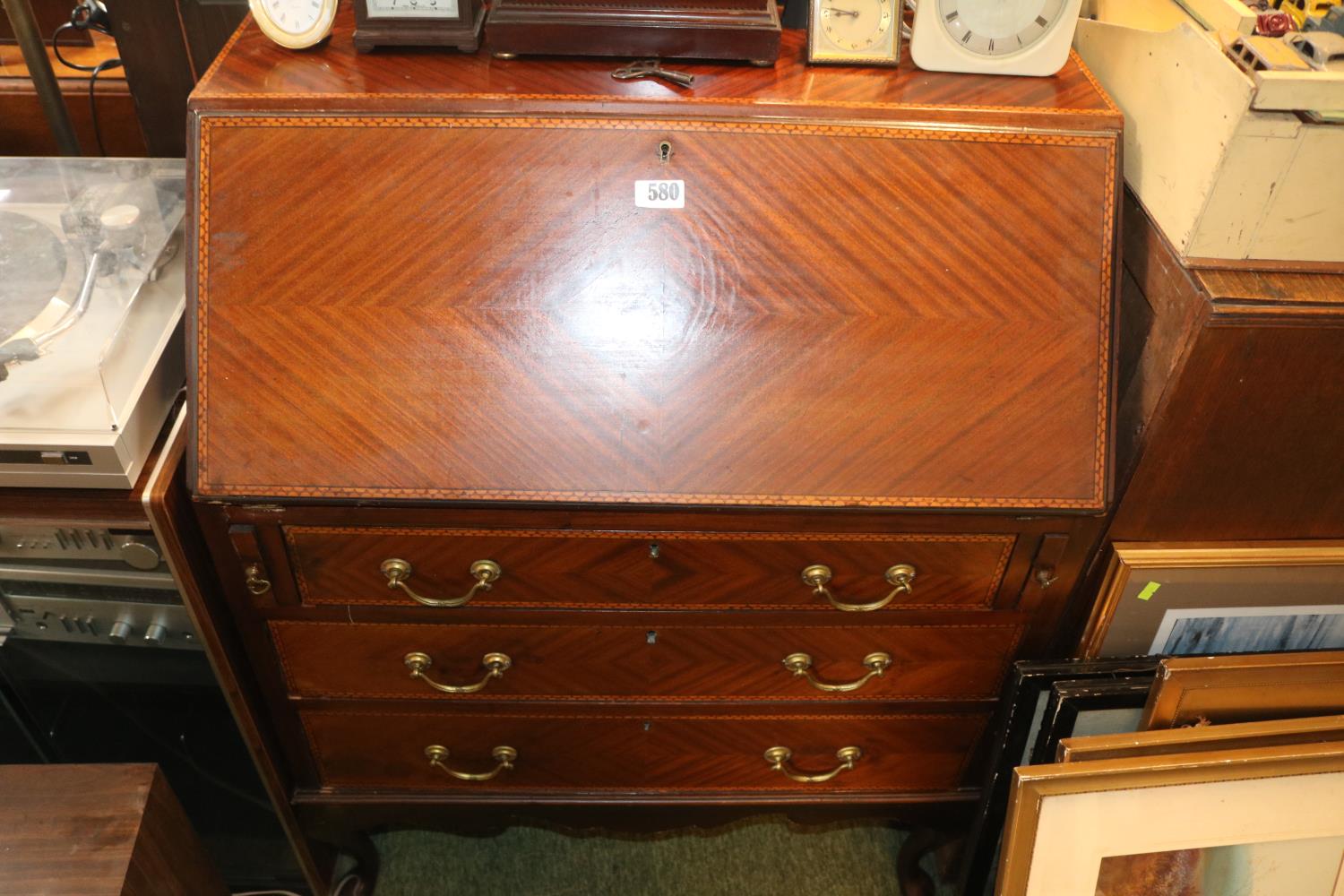 Edwardian Fall Front bureau with brass drop handles over cabriole legs