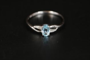 Ladies 9ct White Gold Set Pale oval Topaz set ring Size O. 1.2g total weight