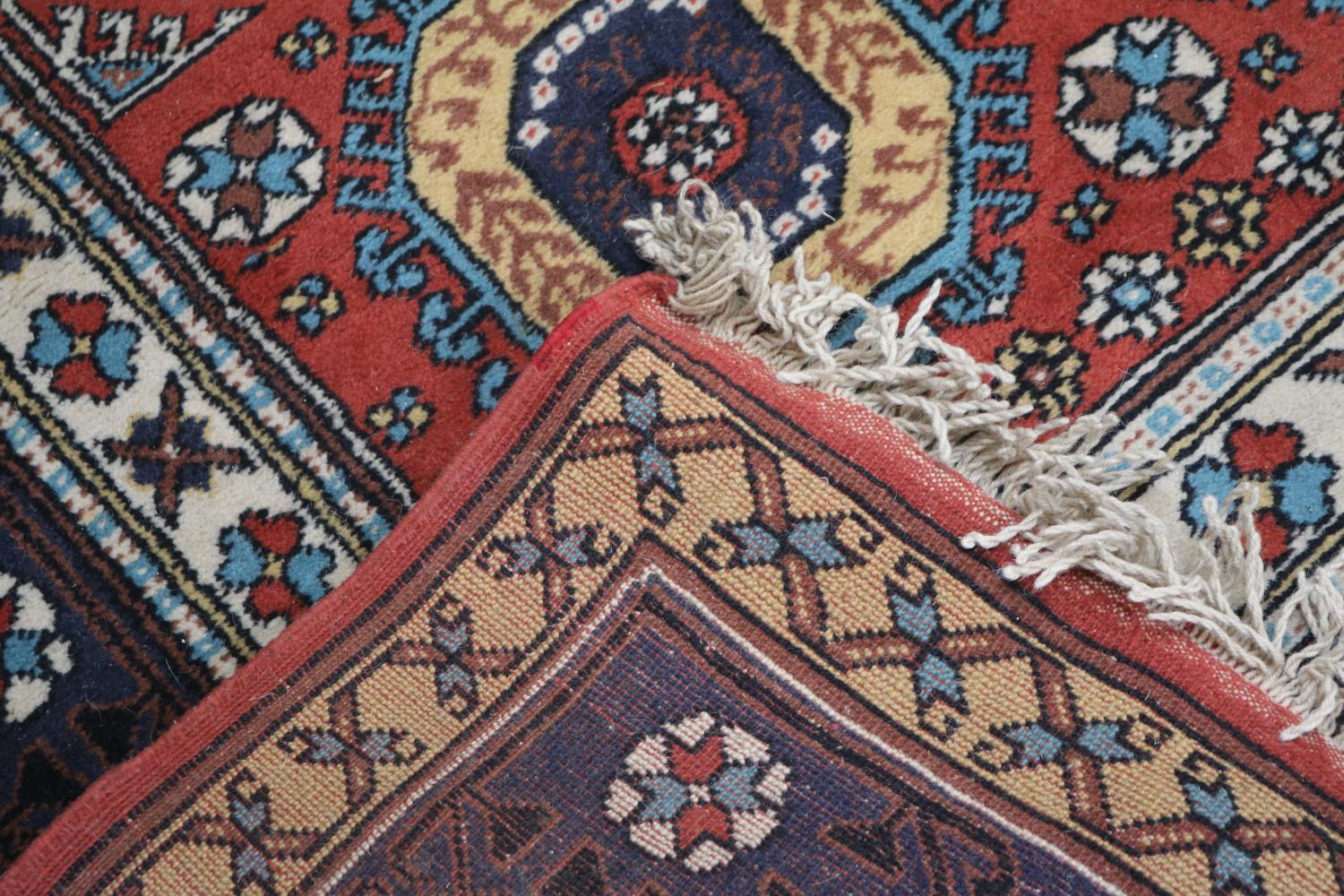 Red Ground Caucasian Kazak type rug 186cm in Length - Image 2 of 2