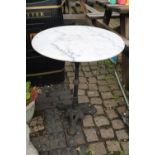 Circular Marble topped table with Cast iron base