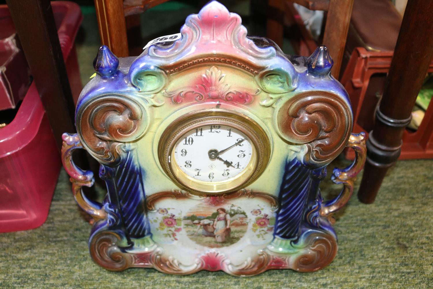European Ceramic mantel clock and a collection of Silver plated tableware