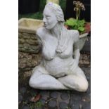 Garden figure of a Woman seated