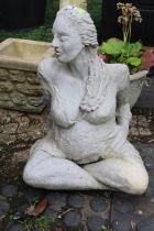 Garden figure of a Woman seated