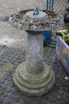 Large concrete bird bath and sun dial