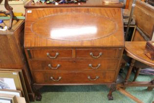 Edwardian Mahogany fall front bureau with metal drop handles over ball and claw feet