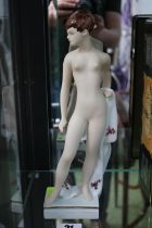 Royal Dux figure of a standing Nude with towel over rectangular base, applied Pink lozenge to base