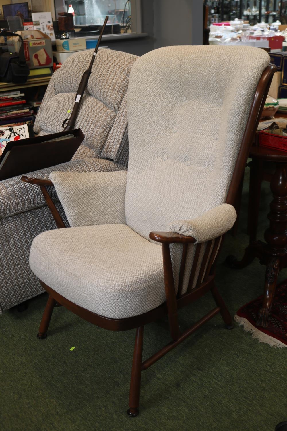 Ercol Spoon back Elbow chair with upholstered seat and back