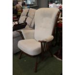 Ercol Spoon back Elbow chair with upholstered seat and back