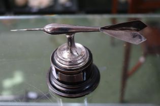 Silver Darts Trophy mounted on circular wooden base London 1955. 15cm in Length