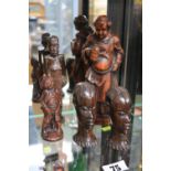 3 African Carved figures, Resin figure of a Monk and another figure (5)