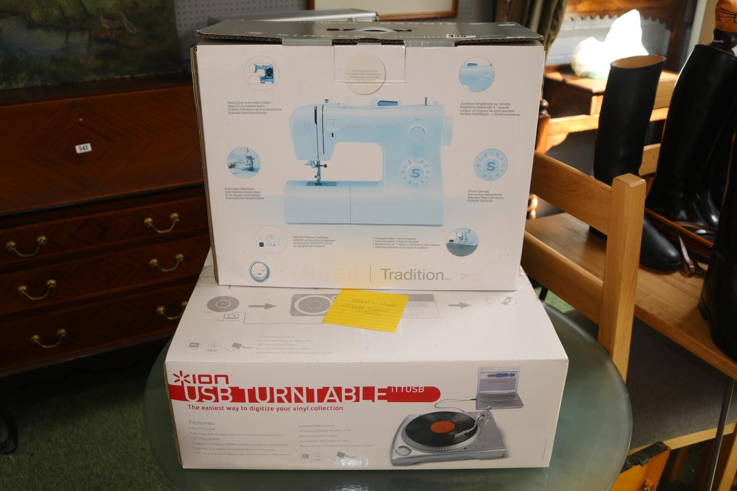 Boxed Singer Tradition Sewing machine and a Ion USB Turntable