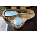 Good Quality Cased Silver Enamelled travelling dressing table set comprising of Powder pot, Brush