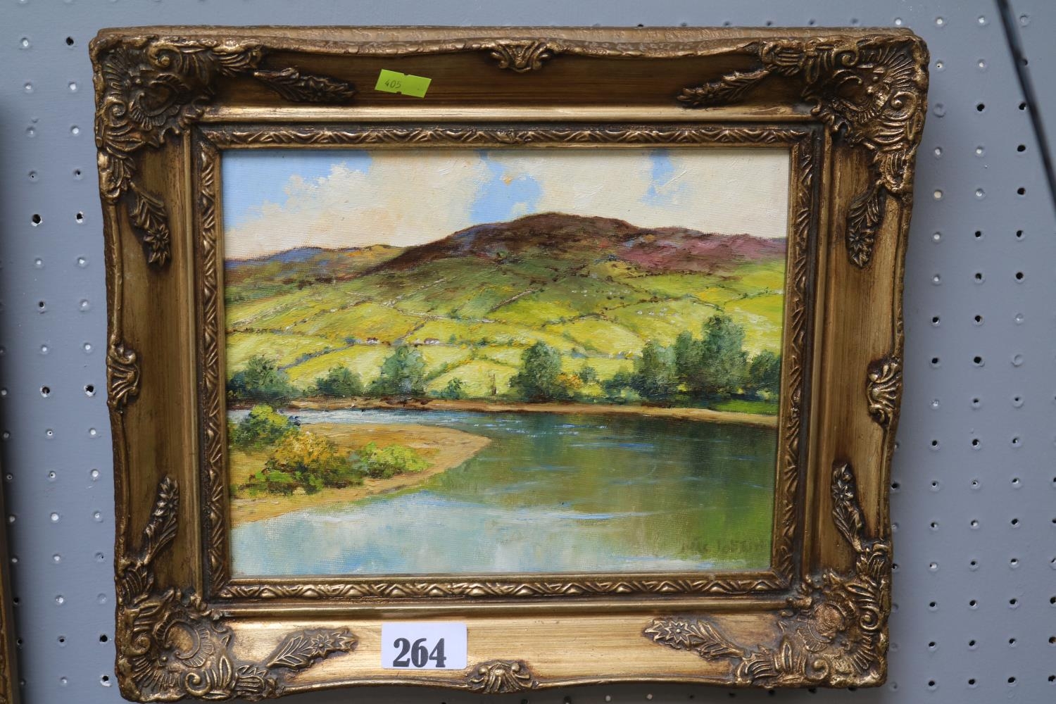 Framed Oil on board depicting a Lakeland scene signed to bottom right