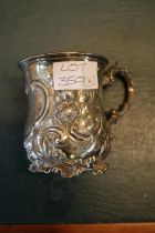 Late 19thC Silver repousse decorated Mug London 1851 185g total weight marked 1842