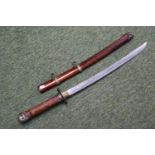 20thC Showcase Katana in wooden scabbard with carved handle. 71cm in Length