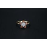 Ladies 10K Gold Diamond Diamond Cluster set ring in the form of a Flower 0.50ct total estimated