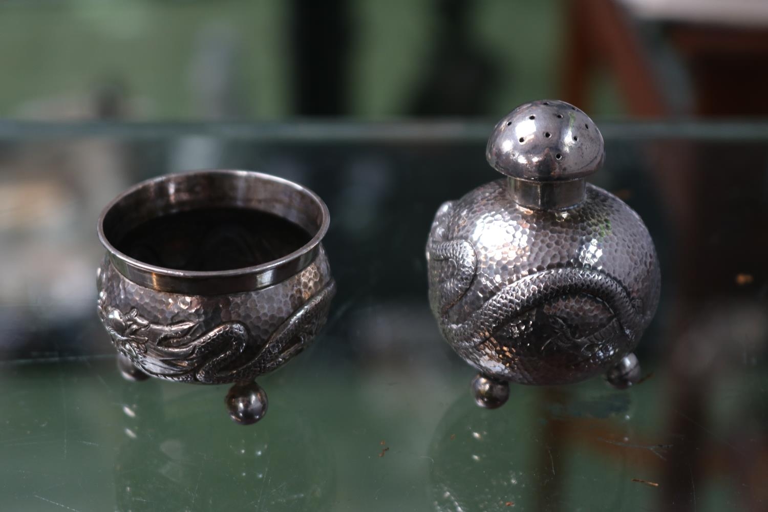 Honk Kong Silver Spherical Dragon decorated Pepperette and open silver on ball feet. 48g total