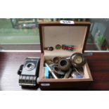 Box of assorted small bygones to include Badges, Buttons, Kodak Camera, Normandy Campaign