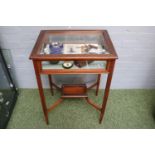 Edwardian Mahogany Collectors Cabinet with glazed top over tapering legs and galleried under tier