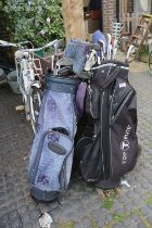 2 Bags of assorted Golf Clubs