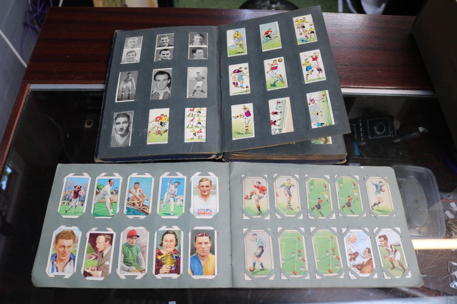 Album of mixed Wills and Players Cigarette Cards and another part Album