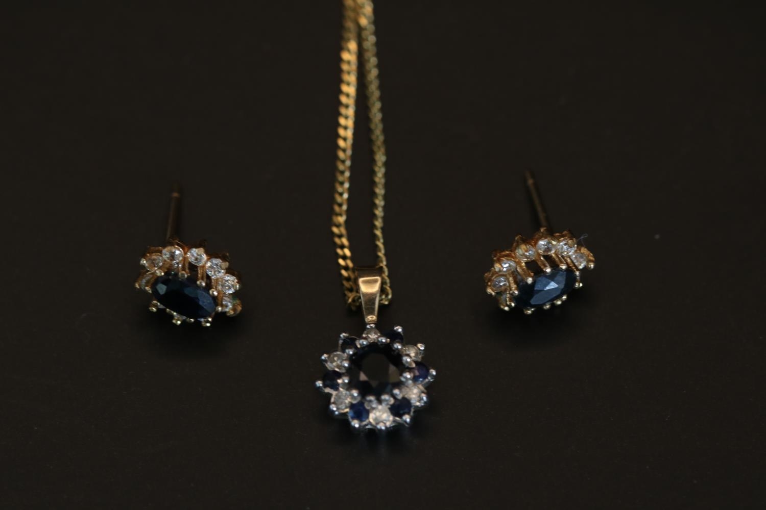 Ladies 9ct Gold Sapphire & CZ Set Pendant and a pair of matched earrings